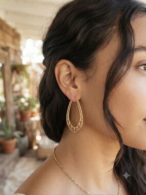 LUCKY BRAND Bronze Teardrop Hoops with a Western Vibe